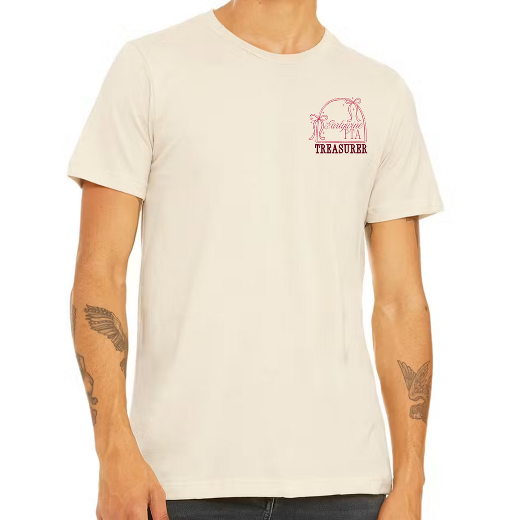 Adult wearing a cream-colored t-shirt featuring the Community Bow design customized with a Treasurer title and organization branding on the left chest.