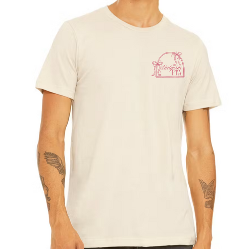 Adult wearing a cream-colored t-shirt featuring the Community Bow design with customizable school and organization branding on the left chest.